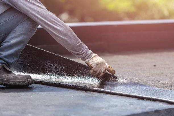 Professional Basement Waterproofing technician working in Kent, NY